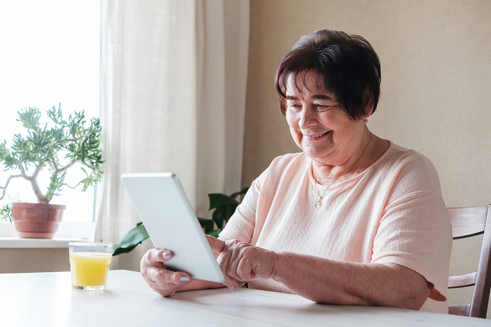 Granny uses the tablet